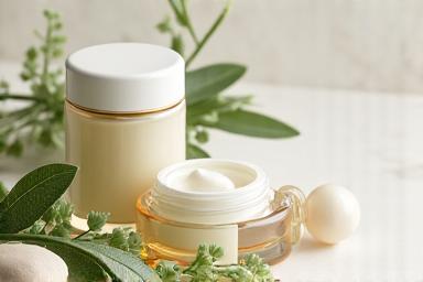 Natural skincare products in elegant packaging, with botanical elements, showcasing purity and luxury.